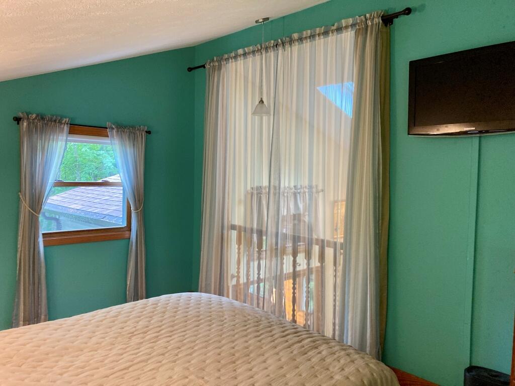 66 Old Falls Pond Road Alfred, ME 04002 - Photo 17 of 39 Master bedroom balcony