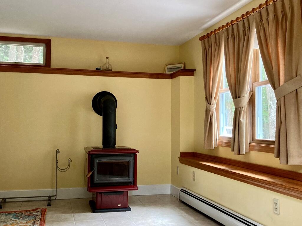 66 Old Falls Pond Road Alfred, ME 04002 - Photo 30 of 39 Lower level wood stove