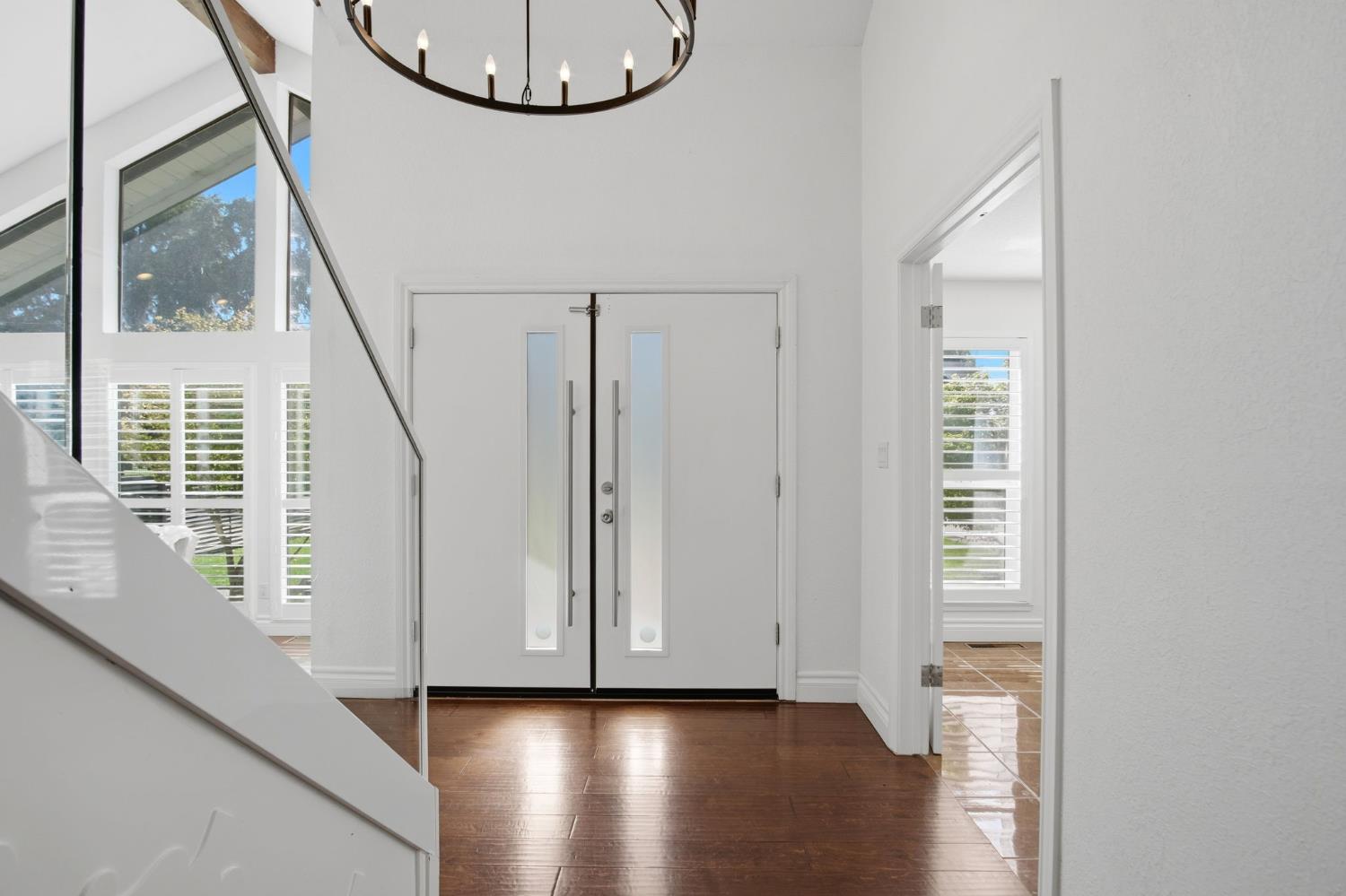 10401 Golf Link Road Turlock, CA 95380 - Photo 7 of 63 a view of an entryway with wooden floor