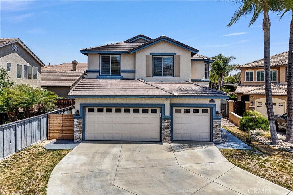 a front view of a house with a garage