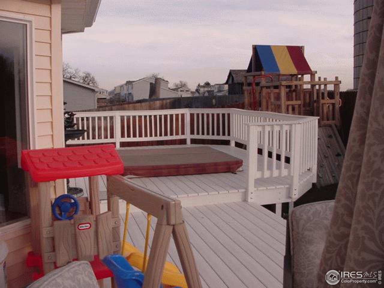 1317 Trail Ridge Road Longmont, CO 80504 - Photo 3 of 8 a view of a balcony with furniture