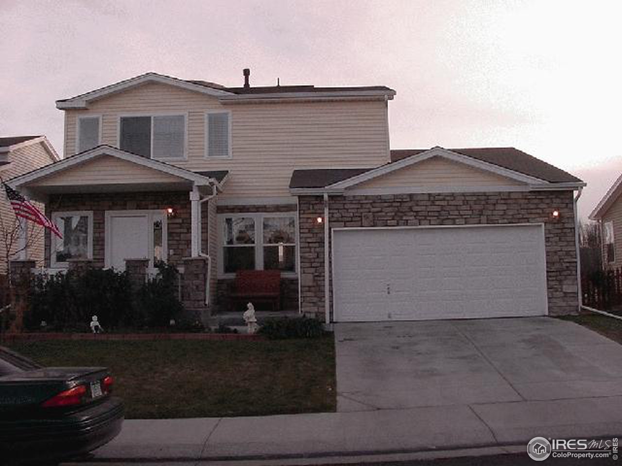 1317 Trail Ridge Road Longmont, CO 80504 - Photo 8 of 8 a front view of a house with garden