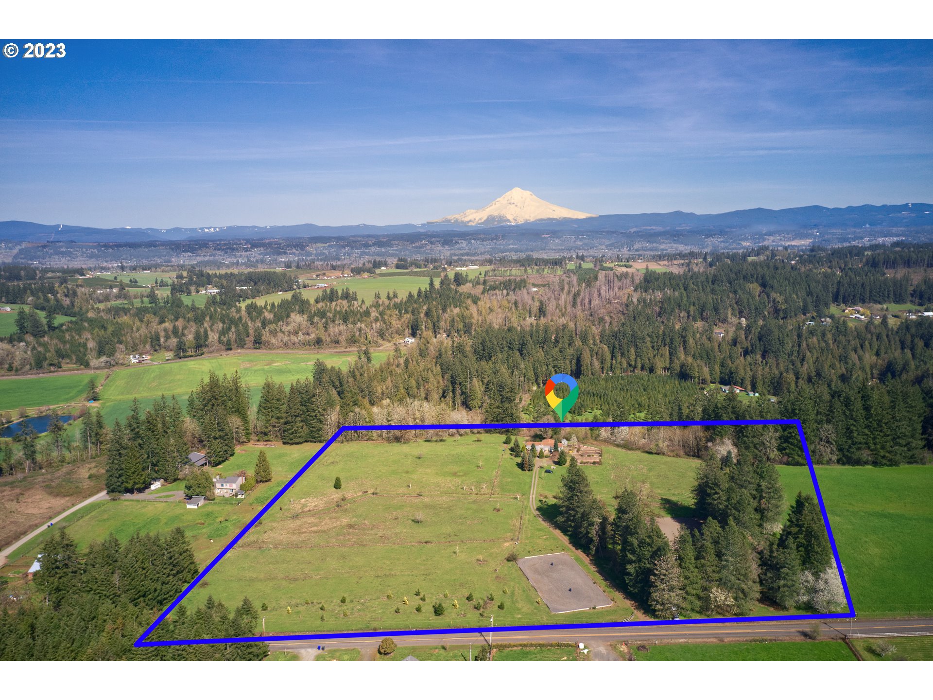 18950 South Ridge Road Oregon City, OR 97045 - Photo 1 of 27 a view of swimming pool with a garden and mountain view