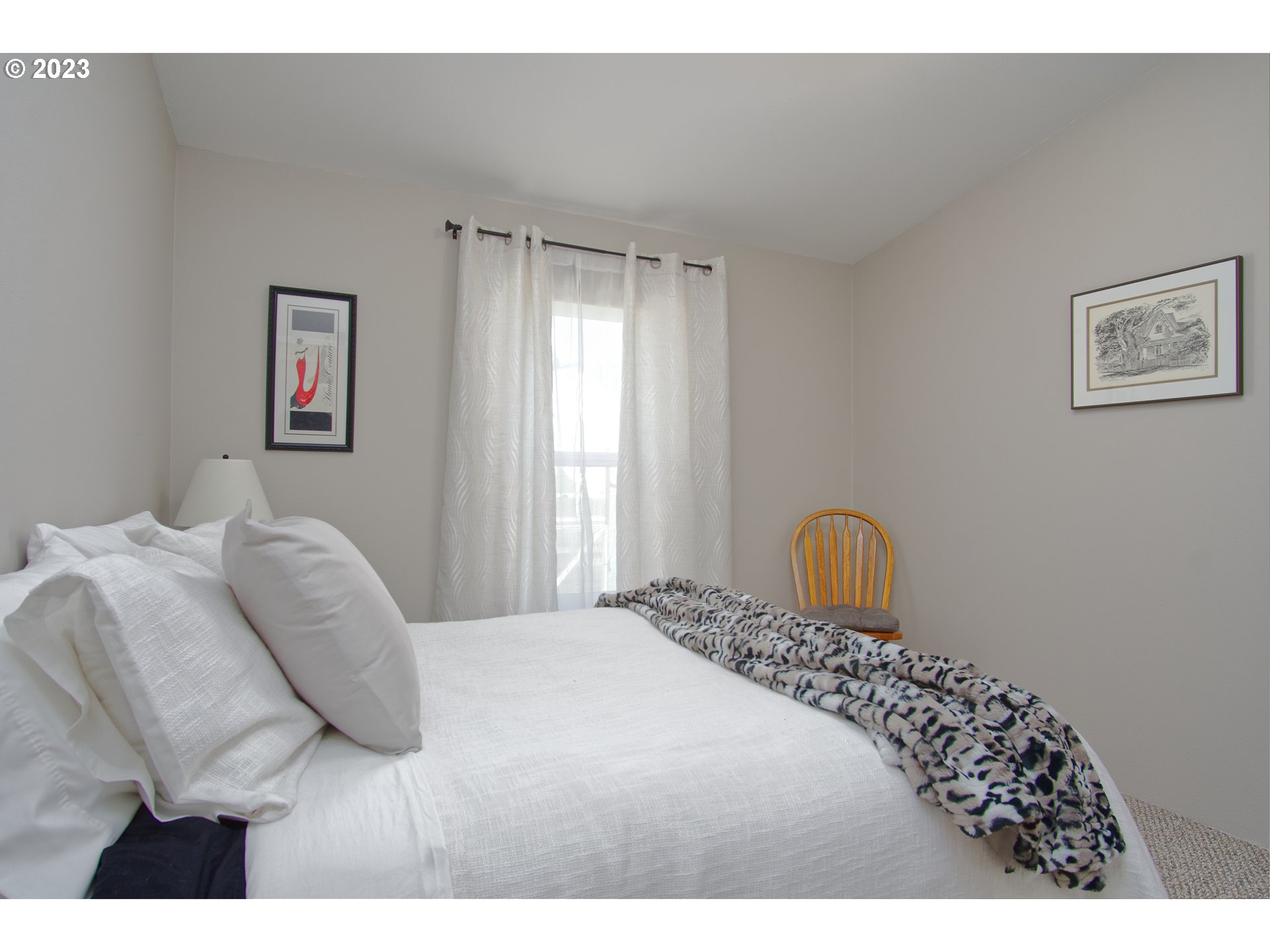 18950 South Ridge Road Oregon City, OR 97045 - Photo 16 of 27 a bedroom with a bed and a window