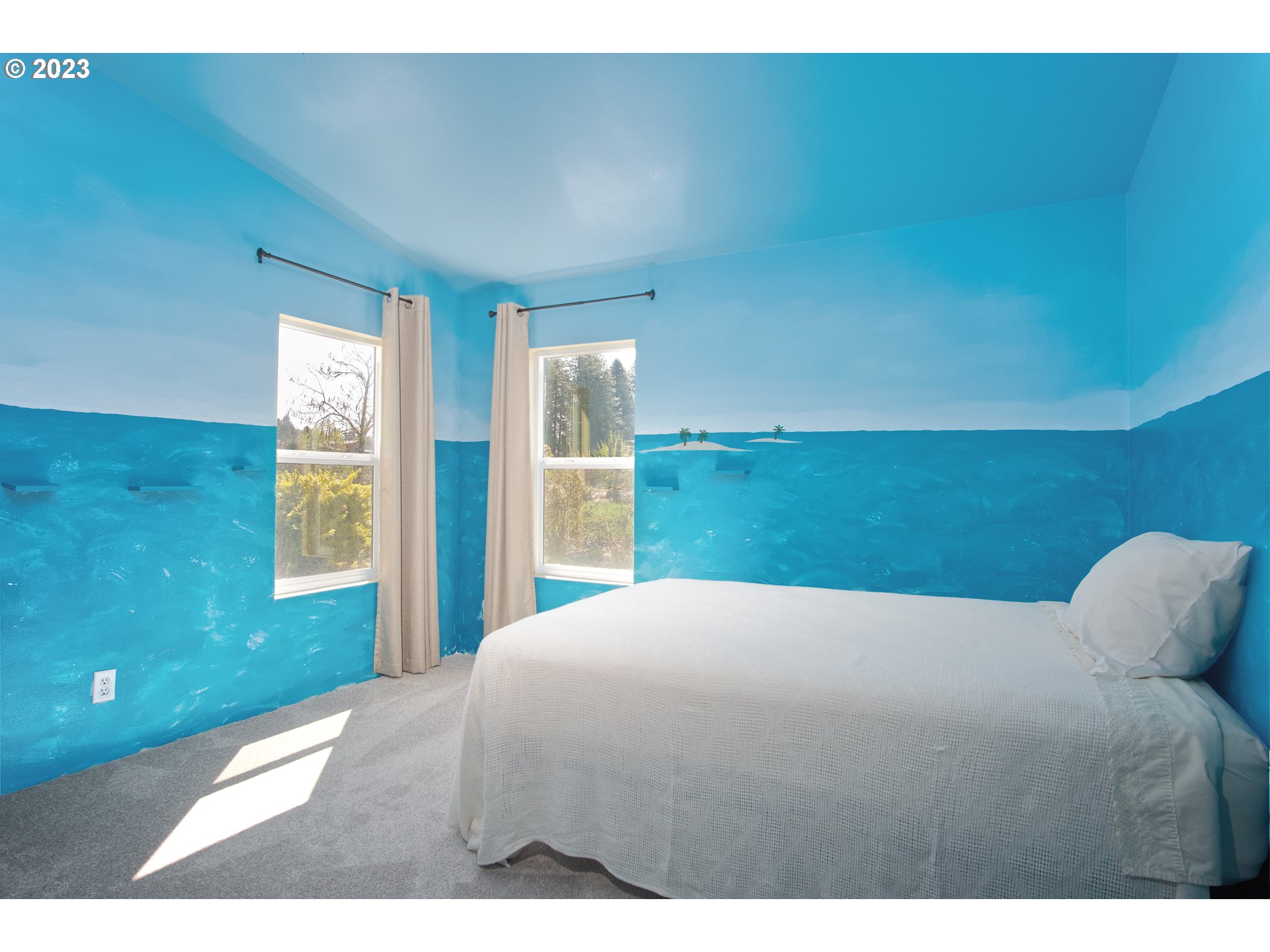 18950 South Ridge Road Oregon City, OR 97045 - Photo 17 of 27 a bedroom with a bed and a window