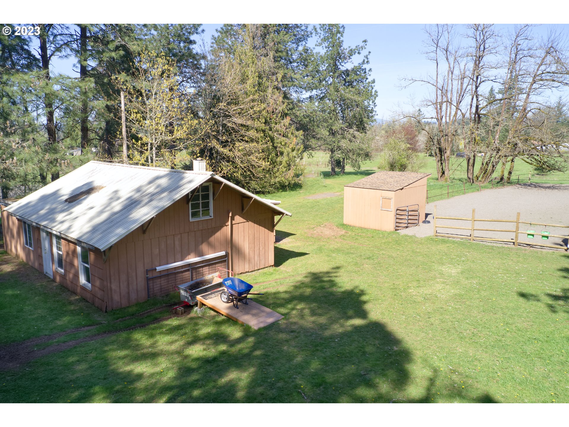 18950 South Ridge Road Oregon City, OR 97045 - Photo 20 of 27 a house view with a backyard space