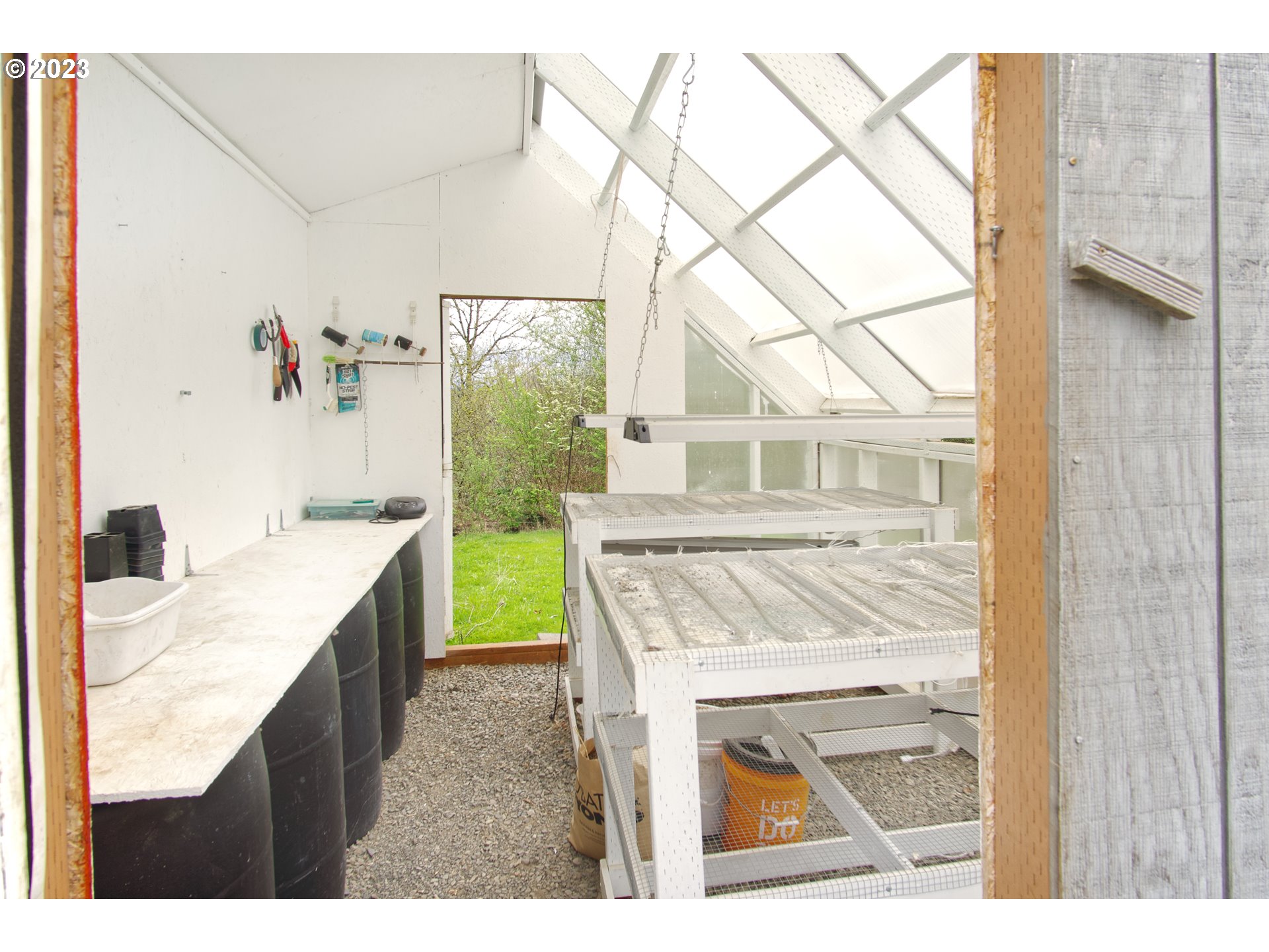 18950 South Ridge Road Oregon City, OR 97045 - Photo 25 of 27 a kitchen with a sink and a refrigerator