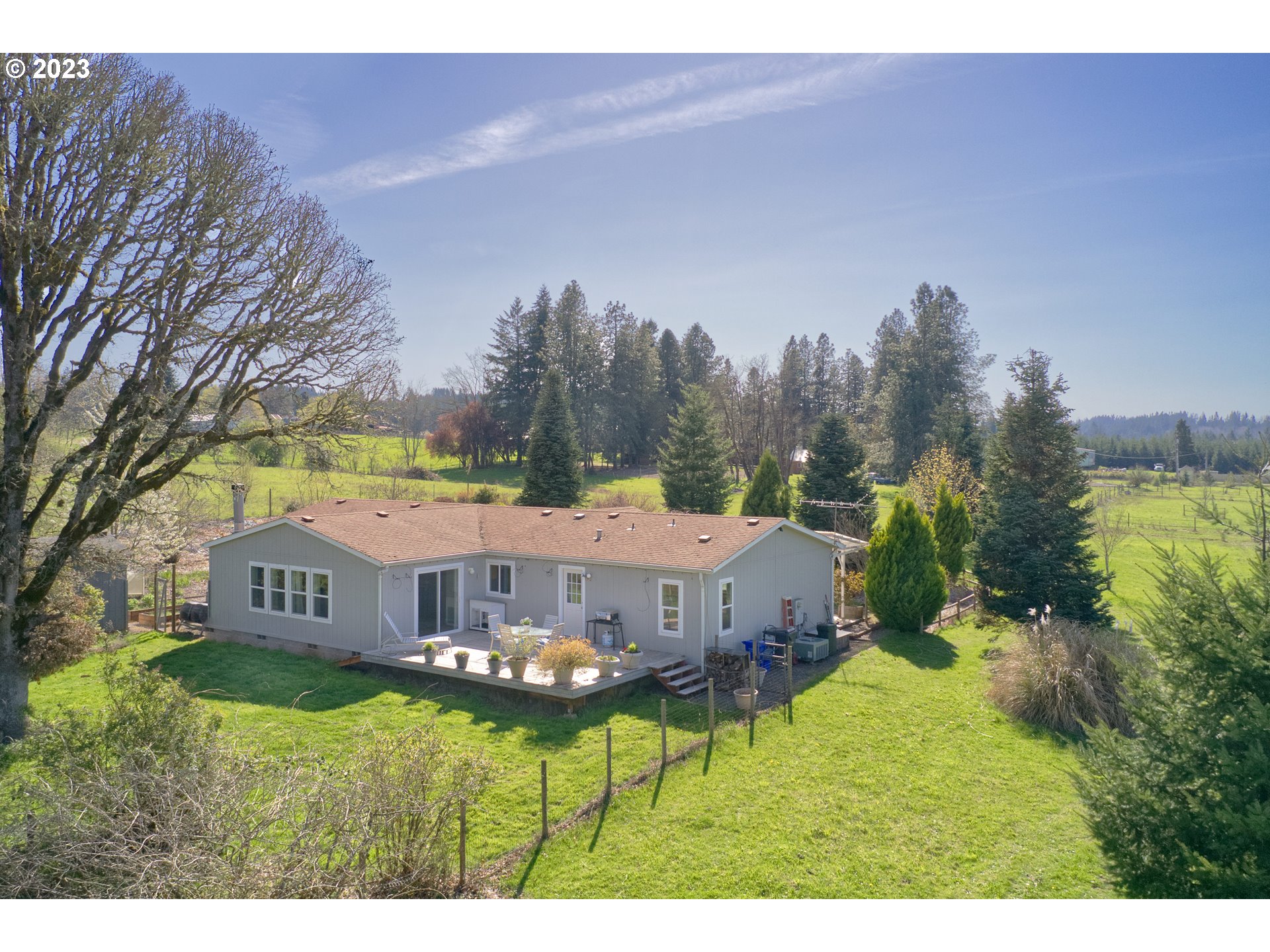 18950 South Ridge Road Oregon City, OR 97045 - Photo 26 of 27 a view of a house with a big yard