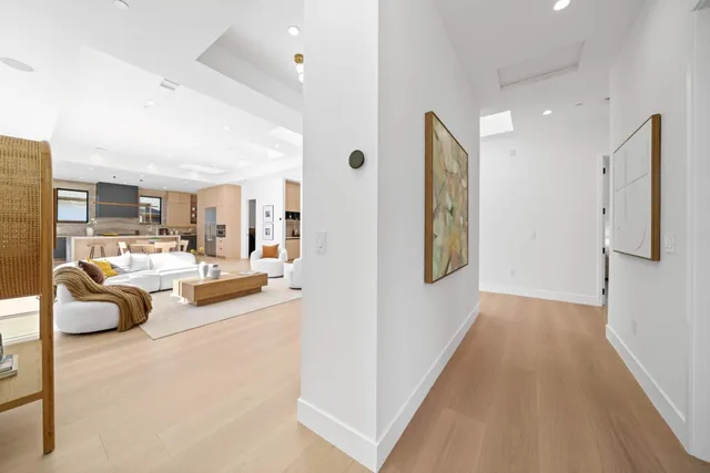 a large kitchen with stainless steel appliances lots of counter top space