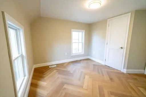 a view of an empty room and window