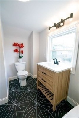 35 Wright Street Stoneham, MA 02180 - Photo 13 of 19 a bathroom with a sink mirror and toilet