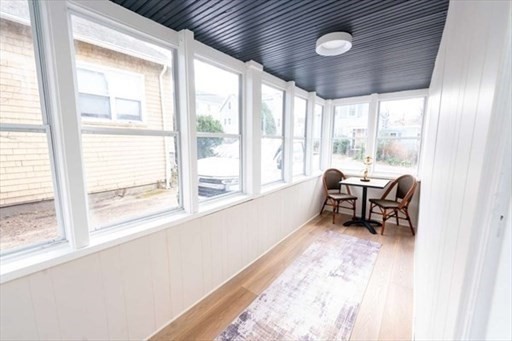 35 Wright Street Stoneham, MA 02180 - Photo 16 of 19 a work room with furniture and a large window
