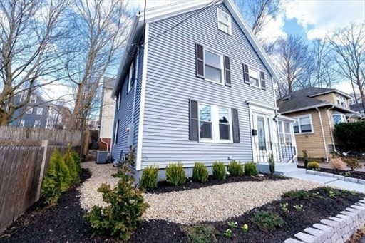35 Wright Street Stoneham, MA 02180 - Photo 18 of 19 a front view of a house with garden