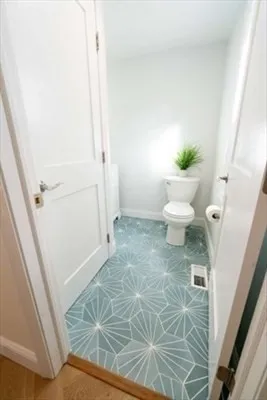 a bathroom with a sink and toilet
