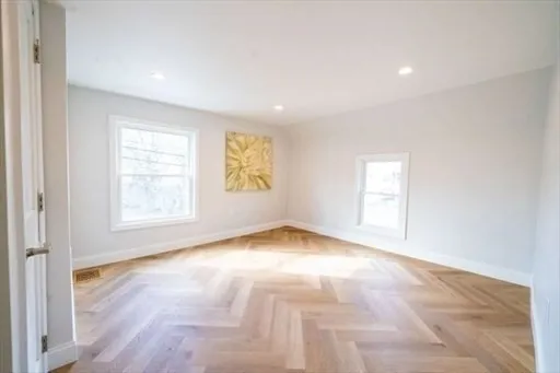 an empty room with windows