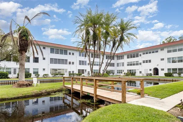 a view of a lake with building