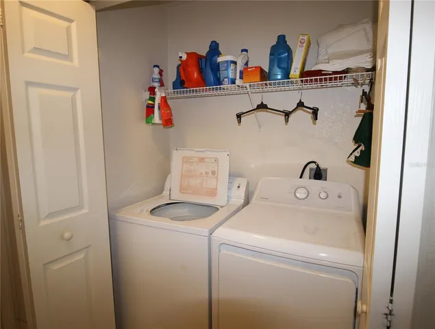 a utility room with dryer and washer