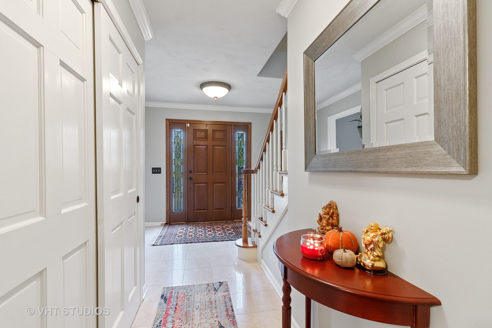 985 Chapel Court North Glen Ellyn, IL 60137 - Photo 14 of 39 a bathroom with a sink mirror and vanity