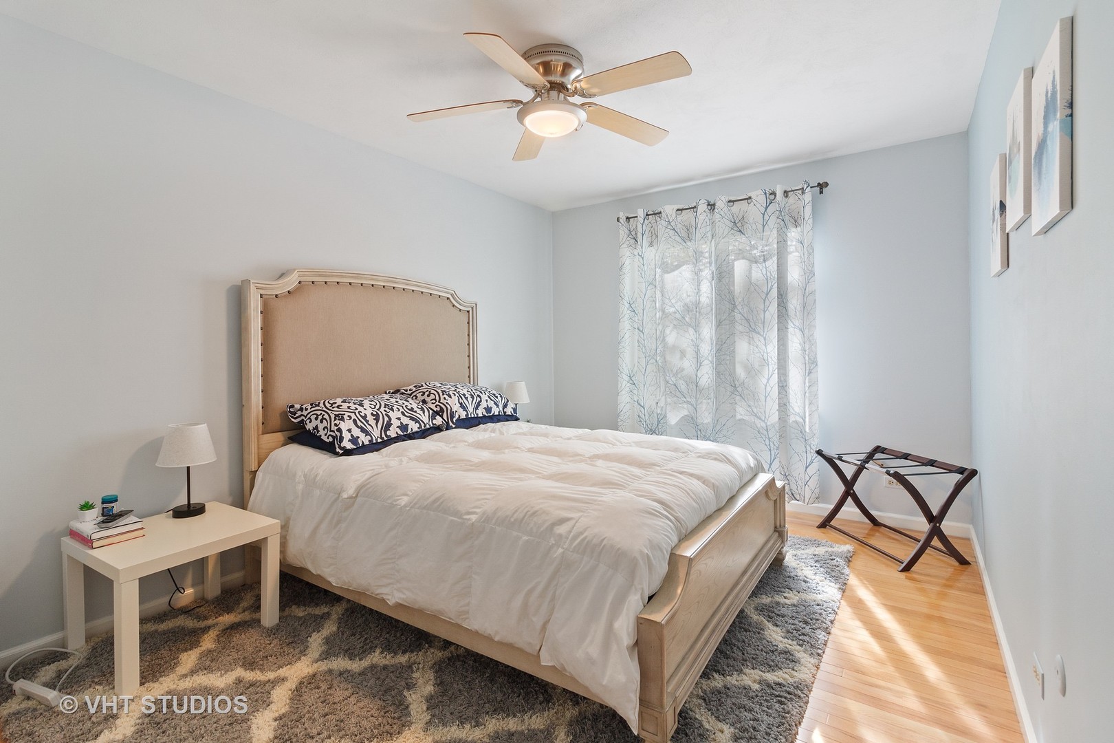 985 Chapel Court North Glen Ellyn, IL 60137 - Photo 18 of 39 a bedroom with a bed and a chandelier