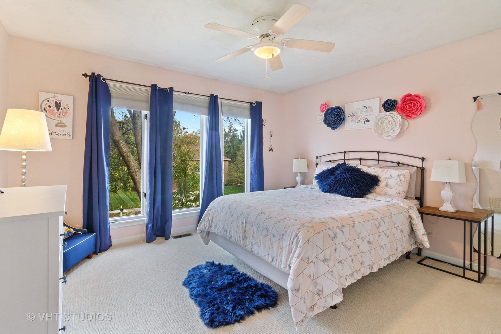 985 Chapel Court North Glen Ellyn, IL 60137 - Photo 19 of 39 a bedroom with a bed dresser and a large window