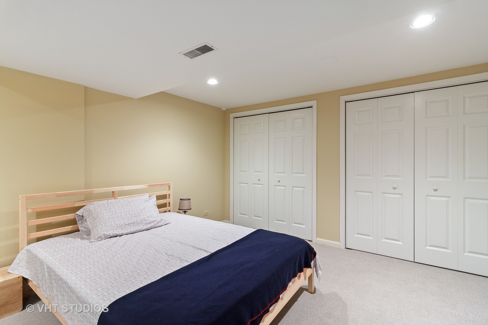 985 Chapel Court North Glen Ellyn, IL 60137 - Photo 20 of 39 a bedroom with a bed and a walk in closet