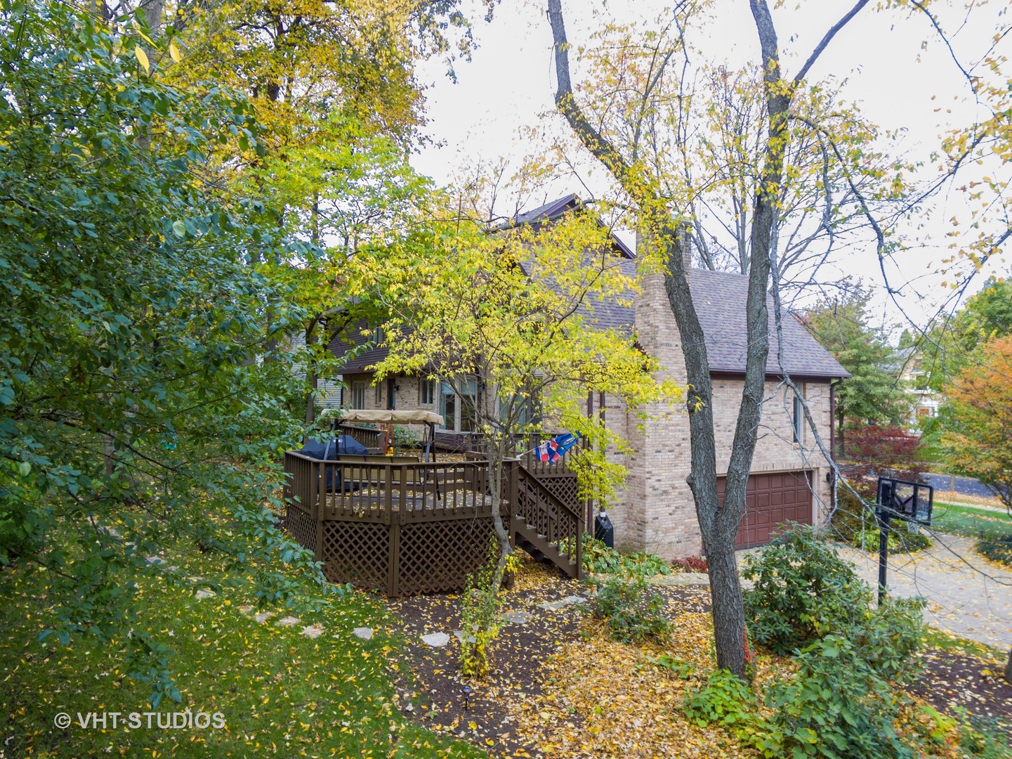 985 Chapel Court North Glen Ellyn, IL 60137 - Photo 38 of 39 a view of a house with a large tree and a yard