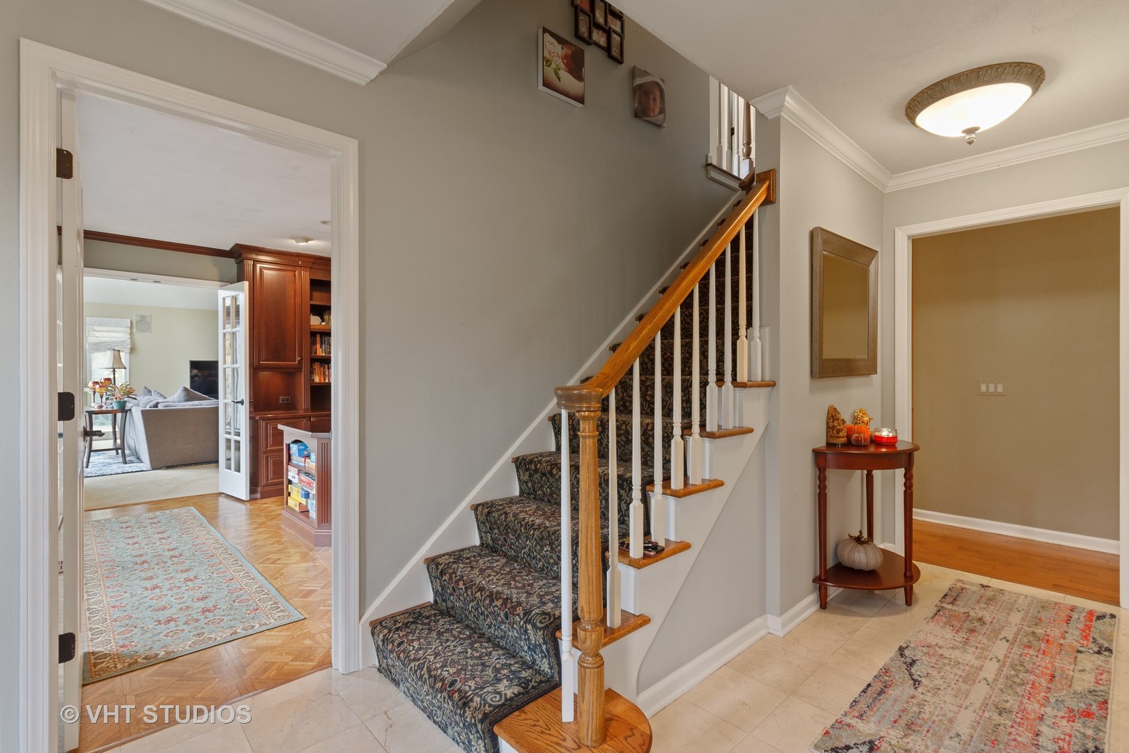 985 Chapel Court North Glen Ellyn, IL 60137 - Photo 5 of 39 a view of hallway with wooden floor and stairs