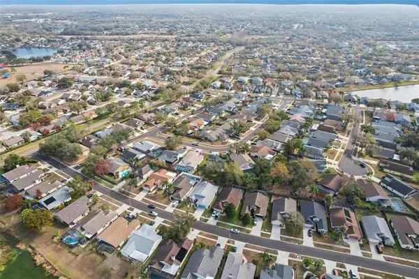 an aerial view of a house with swimming pool