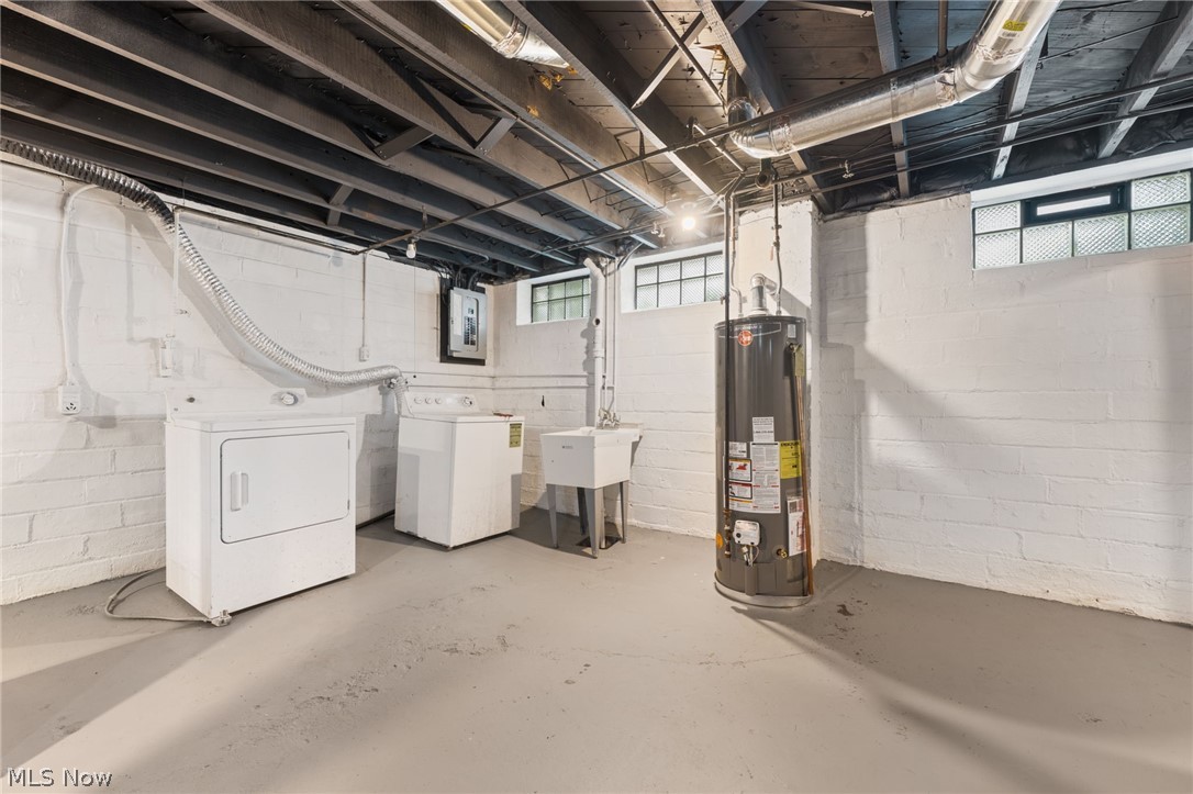 4548 Turney Road Cleveland, OH 44105 - Photo 29 of 35 Basement with washing machine and clothes dryer