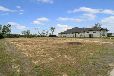 a view of a lake from a yard