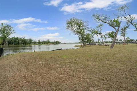 a view of a lake with outdoor space