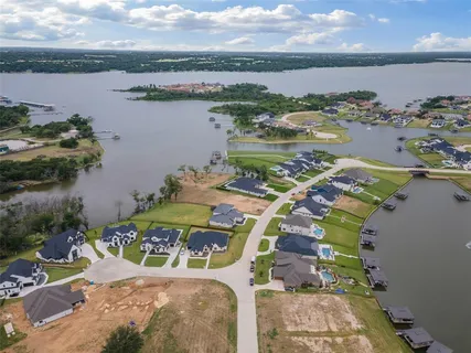 an aerial view of a city with ocean view