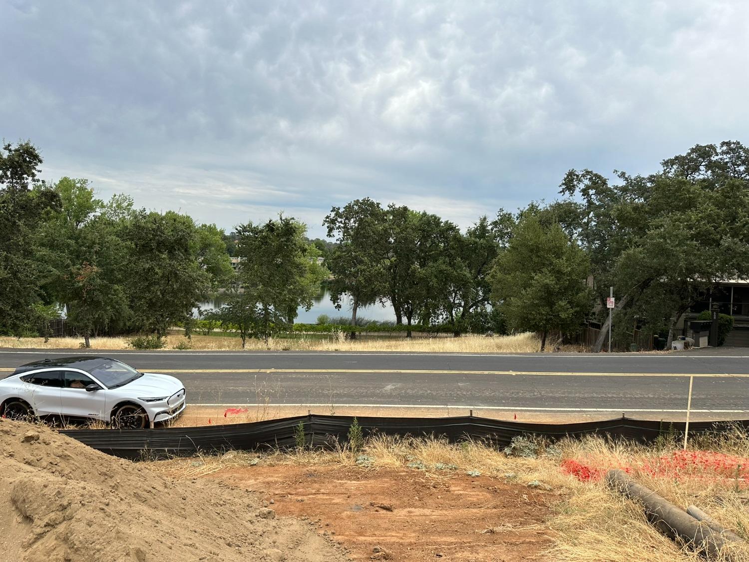 3053 Cambridge Road Cameron Park, CA 95682 - Photo 15 of 22 a view of a swimming pool and a yard
