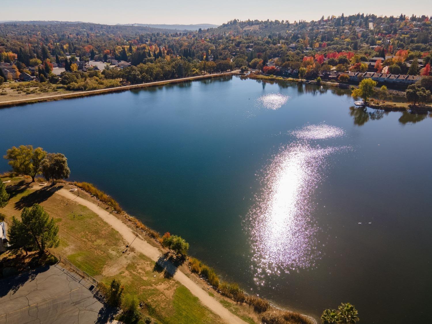 3053 Cambridge Road Cameron Park, CA 95682 - Photo 17 of 22 a view of a lake in middle of the town