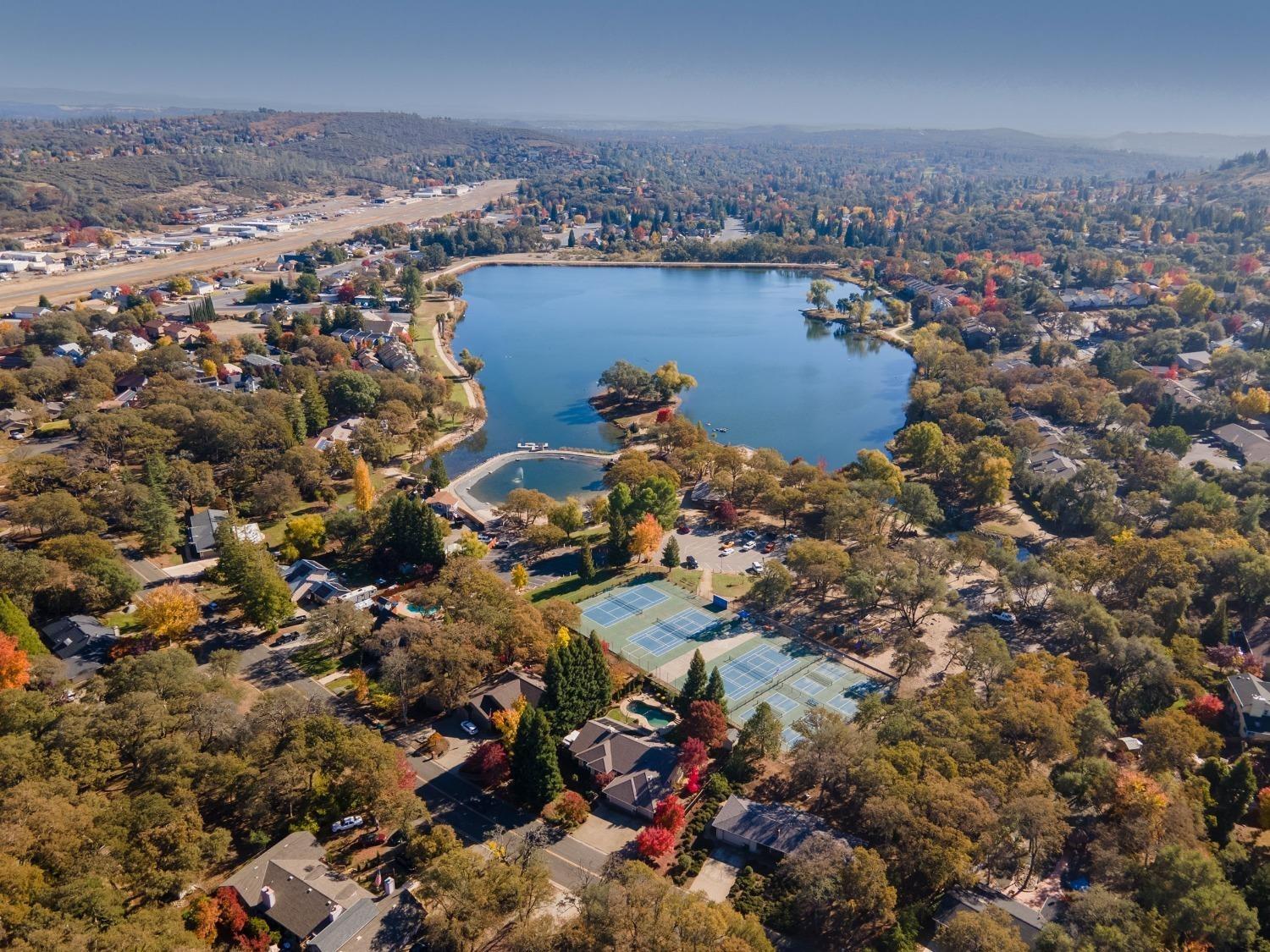 3053 Cambridge Road Cameron Park, CA 95682 - Photo 19 of 22 an aerial view of a houses with a lake
