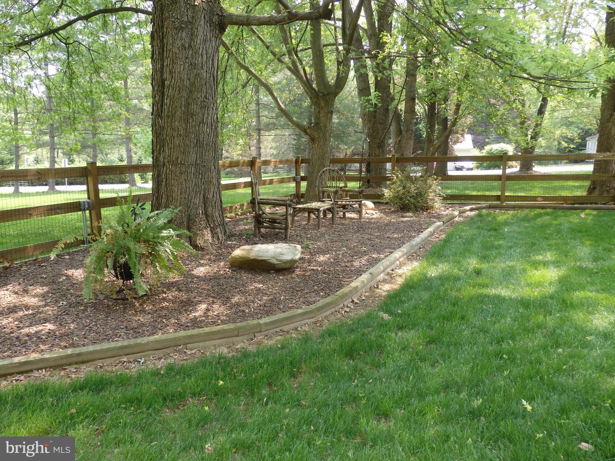 9212 Bethel Road Frederick, MD 21702 - Photo 28 of 30 Park-like sitting area at side yard