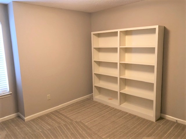 1188 Clear Creek Road Collierville, TN 38017 - Photo 6 of 6 a view of a room with wooden floor and closet
