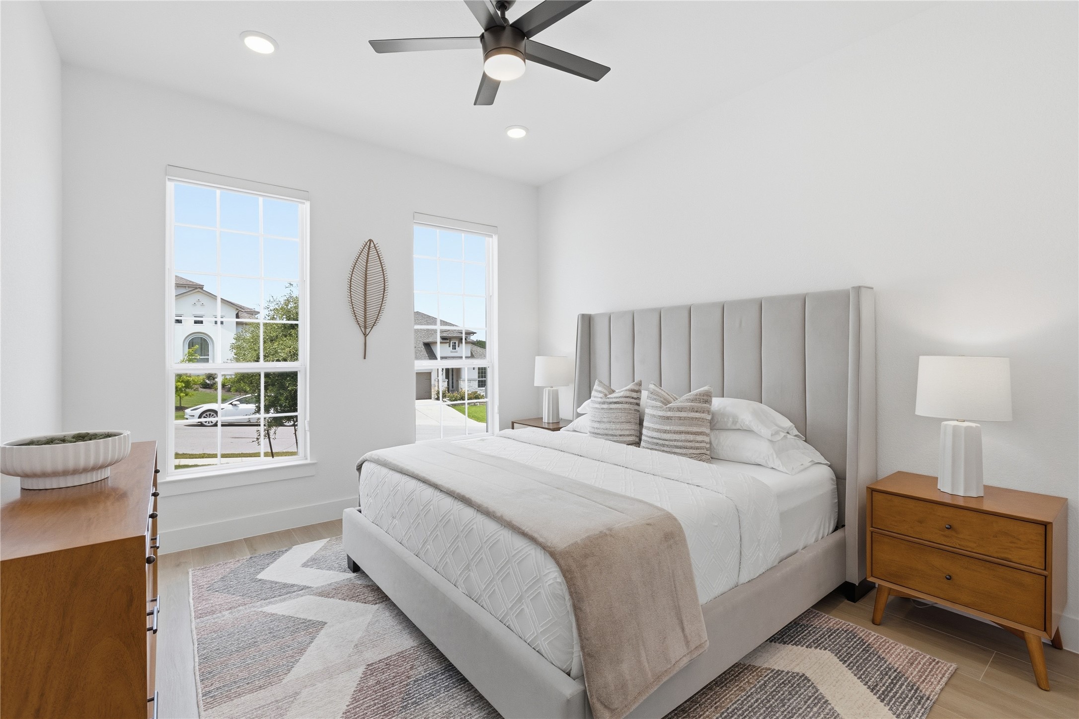 836 Villa Rialto View Leander, TX 78641 - Photo 23 of 33 A well-appointed sleeping sanctuary awaits, featuring ample natural light and a modern aesthetic.