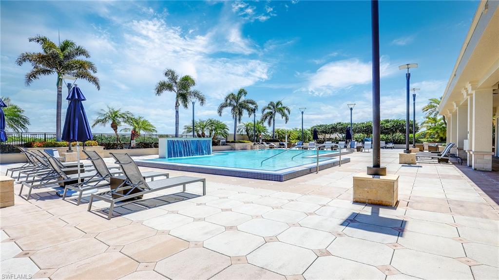 9123 Strada Place, Unit 7409 Naples, FL 34108 - Photo 26 of 34 a view of outdoor space with seating area