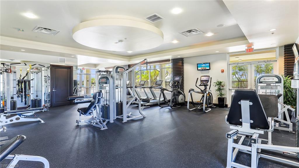 9123 Strada Place, Unit 7409 Naples, FL 34108 - Photo 33 of 34 a view of a room with gym equipment
