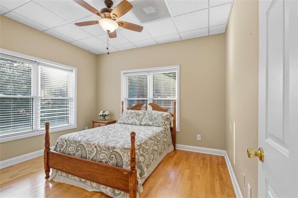 1091 Echota Road Clarkesville, GA 30523 - Photo 53 of 89 a bedroom with a bed and a window