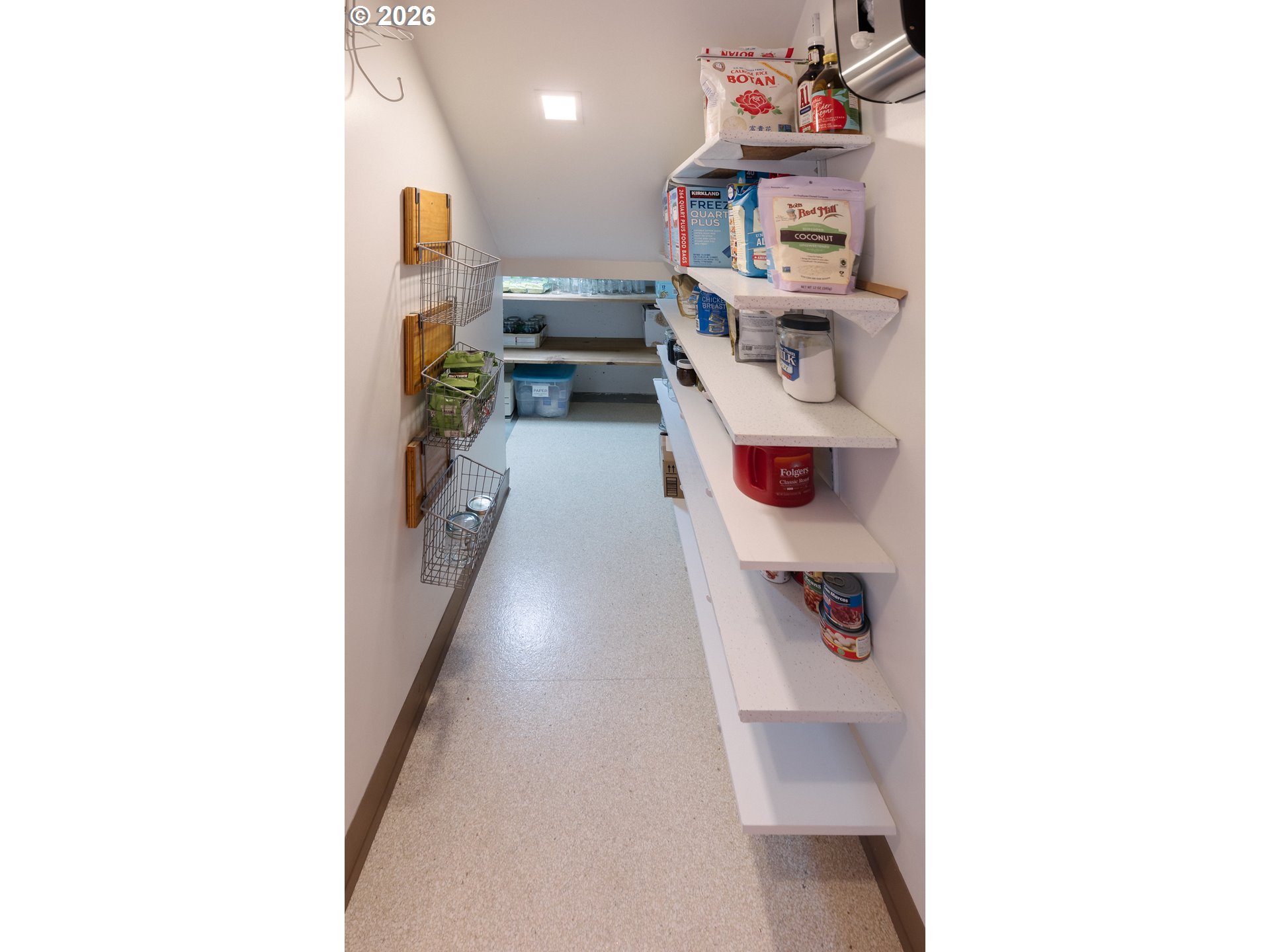 14285 Southwest 114th Avenue Tigard, OR 97224 - Photo 28 of 42 a utility room with stainless steel appliances lots of white furniture