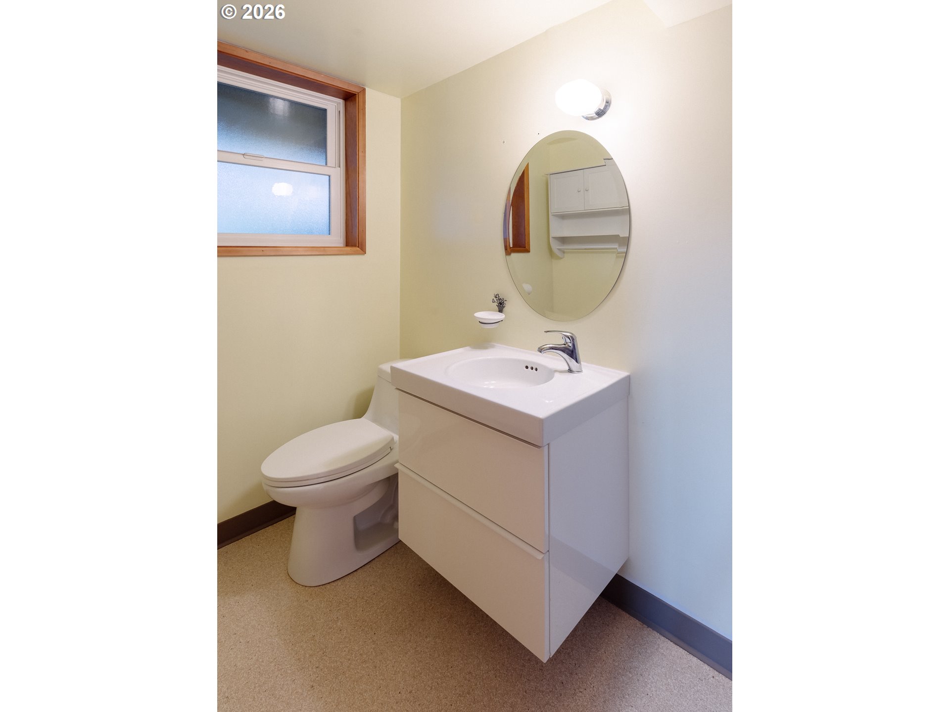 14285 Southwest 114th Avenue Tigard, OR 97224 - Photo 29 of 42 a bathroom with a toilet sink and mirror