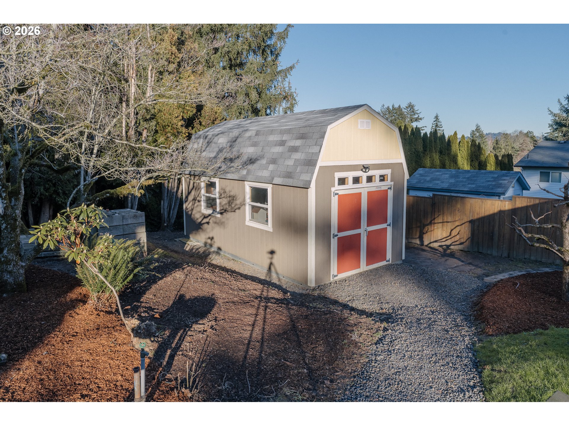 14285 Southwest 114th Avenue Tigard, OR 97224 - Photo 31 of 42 a view of a house with a yard