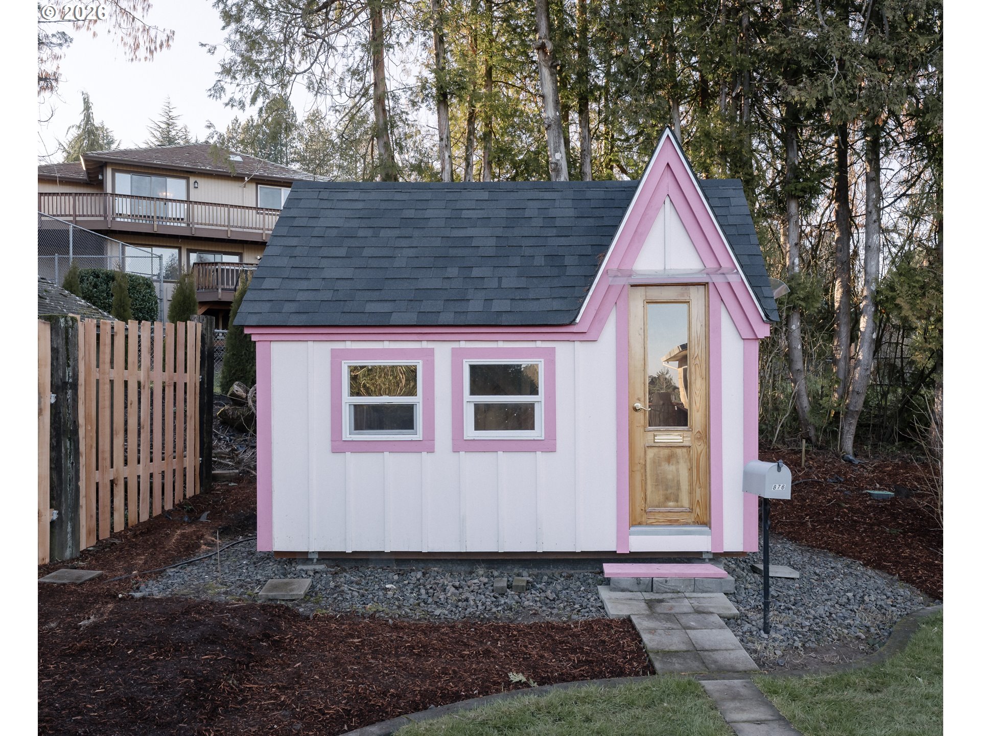 14285 Southwest 114th Avenue Tigard, OR 97224 - Photo 32 of 42 a view of a house with a yard