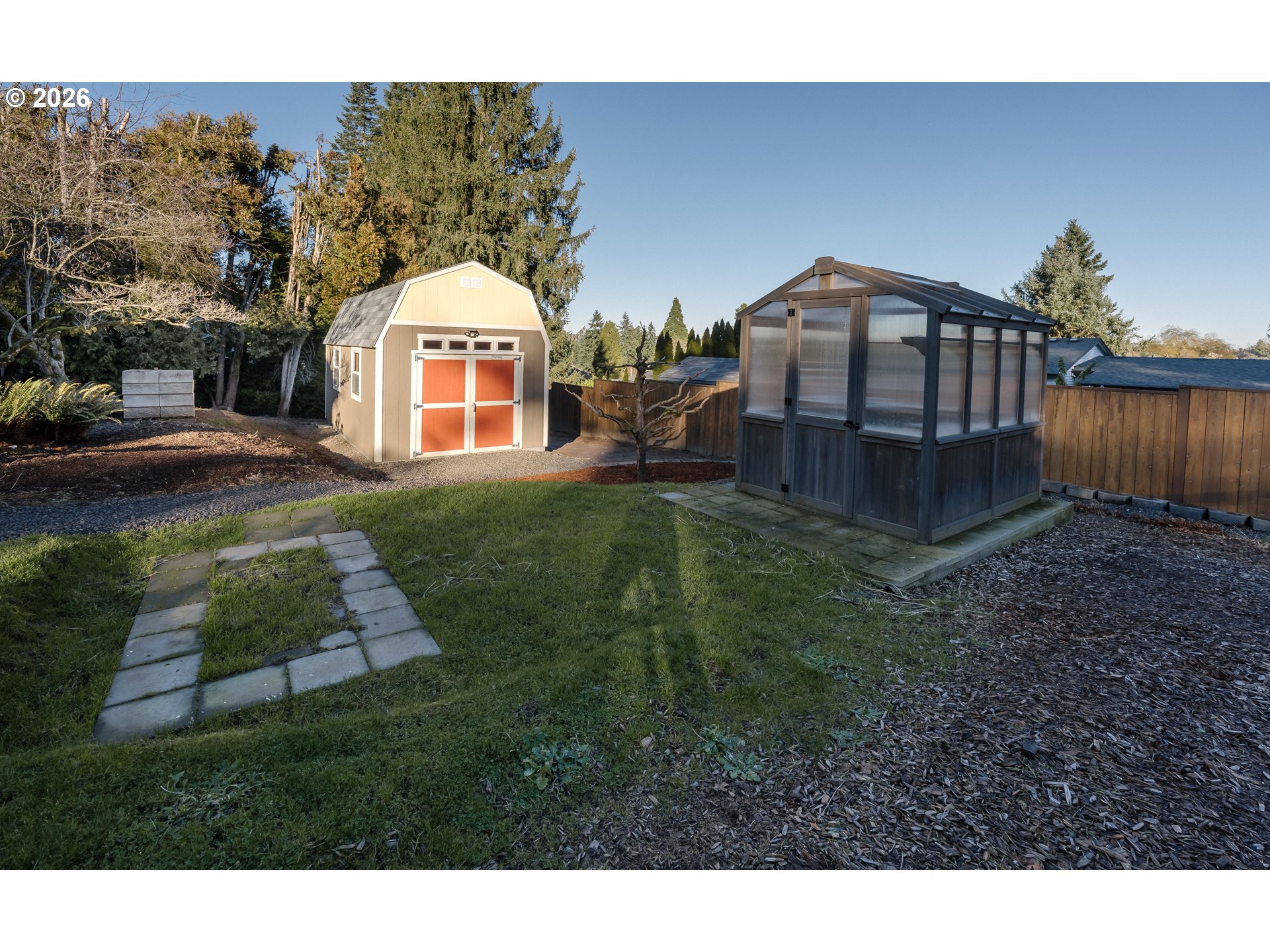 14285 Southwest 114th Avenue Tigard, OR 97224 - Photo 33 of 42 a view of a house with a yard