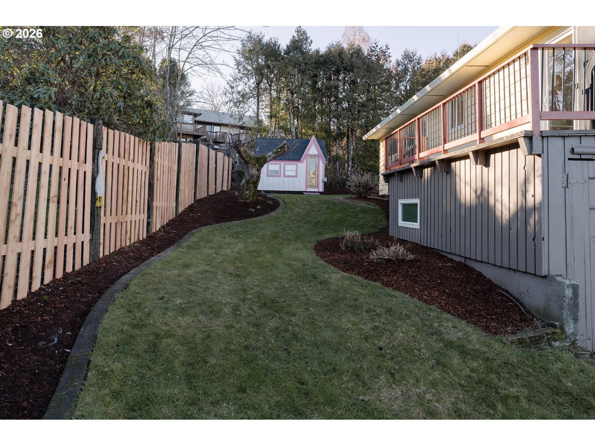 14285 Southwest 114th Avenue Tigard, OR 97224 - Photo 36 of 42 a view of a house with a yard
