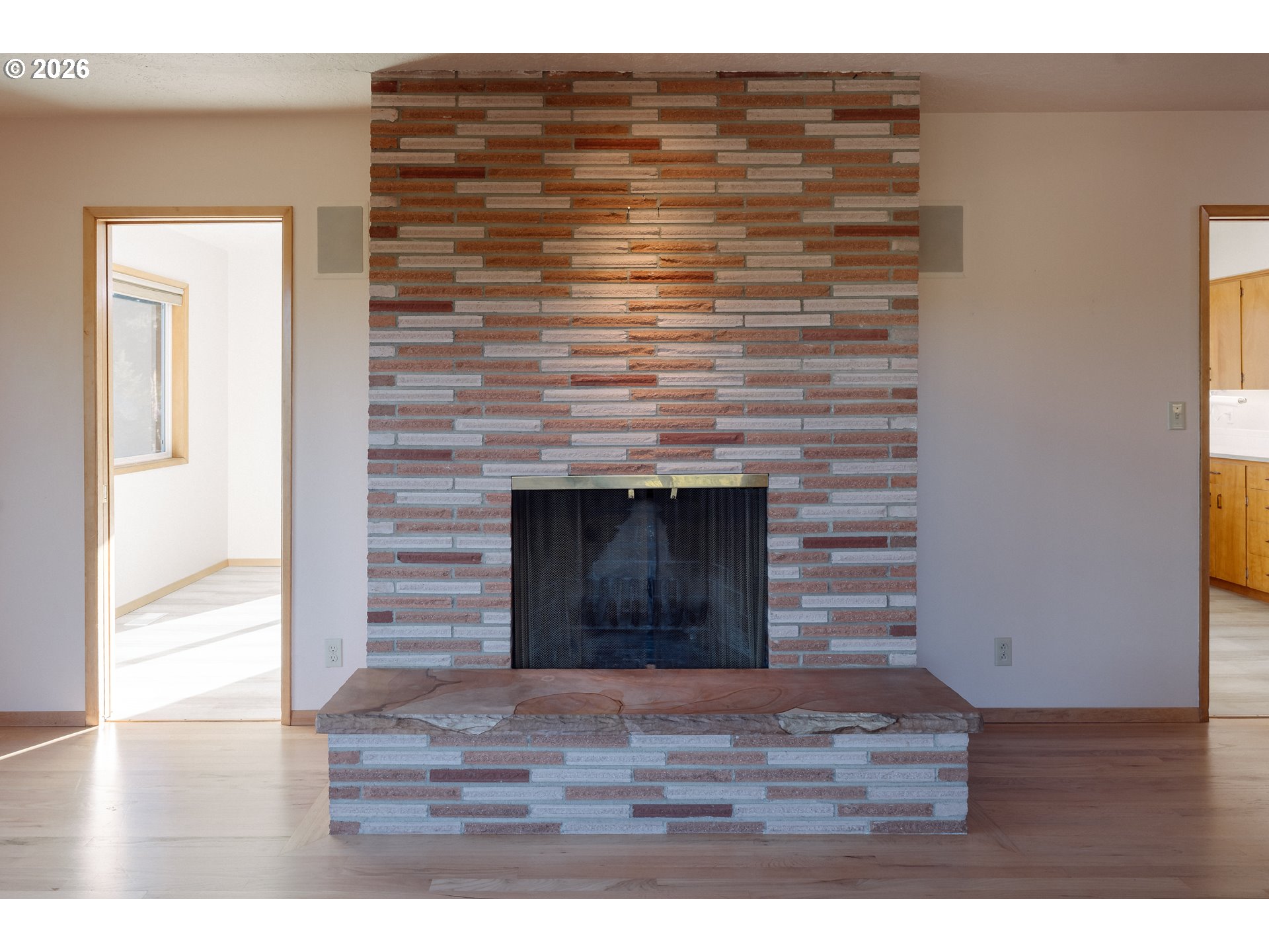 14285 Southwest 114th Avenue Tigard, OR 97224 - Photo 9 of 42 a view of an empty room and wooden floor