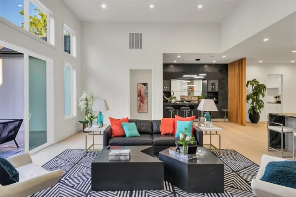 a room with a sink and cabinets