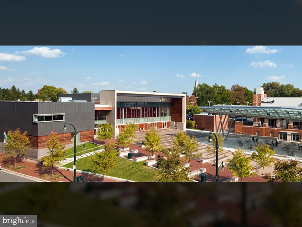 1900 Lyttonsville Road, Unit 714 Silver Spring, MD 20910 - Photo 22 of 22 a view of a swimming pool with an outdoor seating